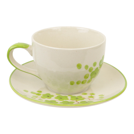 Kop met schotel keramiek rond bloesem groen